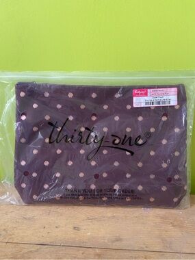 Thirty-One large zipper pouch
Twinkling plum